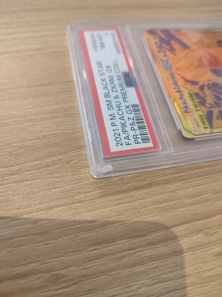 BLACK STAR PROMO FA/PIKACHU & ZEKROM GX PREMIUM COLL PSA 8 #SM248